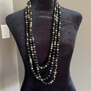 Chanel classic pearl necklace triple strand black gold necklace belt logo